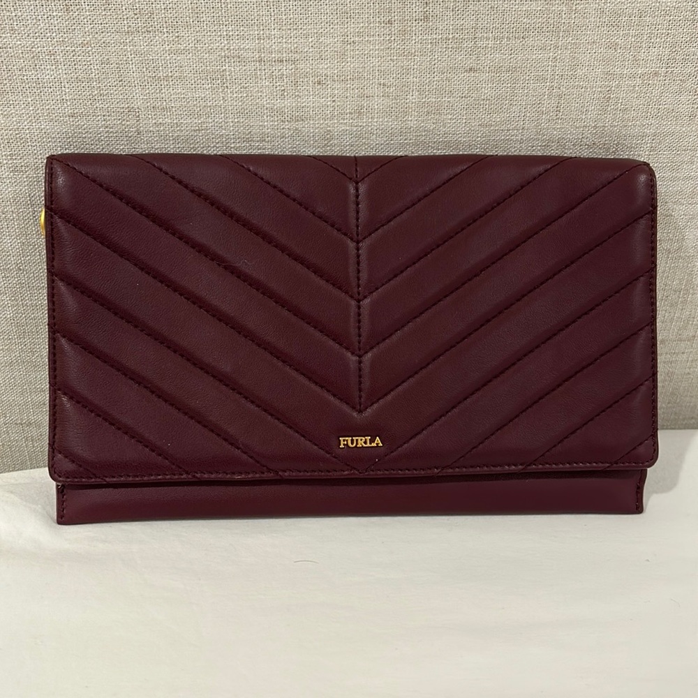 Furla women’s eggplant clutch